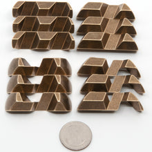 Load image into Gallery viewer, Four sets of three pieces showing the Gumball puzzle disassembled