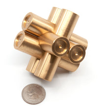 Load image into Gallery viewer, Assembled Brass Monkey One puzzle with a US quarter to give a sense of scale.
