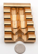Load image into Gallery viewer, Brass Monkey One pieces laid out with a US quarter for scale. The dimple that is just visible in the third piece is by design and helps to hold the key piece in place.