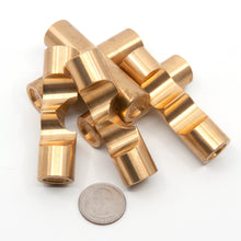 Load image into Gallery viewer,  Disassembled pieces of Brass Monkey Two. Each piece is 70mm long and 19mm in diameter, a US quarter in the foreground illustrates the scale.