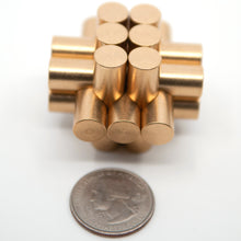Load image into Gallery viewer, A miniture 13 piece cylindrical burr puzzle next to a regular US quarter i.e. a small puzzle not a giant coin.
