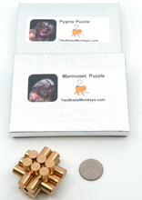 Load image into Gallery viewer, Picture of the silver box each puzzle comes in. Just 103x85x19mm.