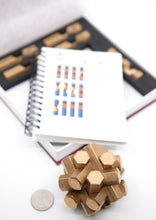 Load image into Gallery viewer, Joy of Hex Extras. A book and five pieces. Yours when you buy the set of three hex puzzles.