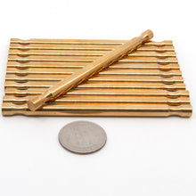 Load image into Gallery viewer, Twelve brass rods which, given enough skill and patience, can be turned into a self supporting, interlocking Nova Plexus sculpture puzzle.