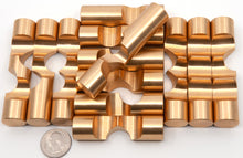 Load image into Gallery viewer, The thirteen precisely machined brass pieces that make up every full Kong puzzle.