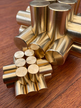 Load image into Gallery viewer, Miniature Pygmy puzzle next to it's bigger brother Kong.