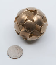 Load image into Gallery viewer, A gobstopper showing a different symmetry axis