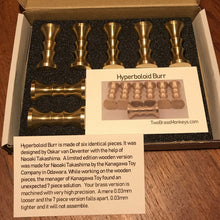 Load image into Gallery viewer, Hyperbolloid piece in custom protective packaging together with information card that accompanies the puzzle.