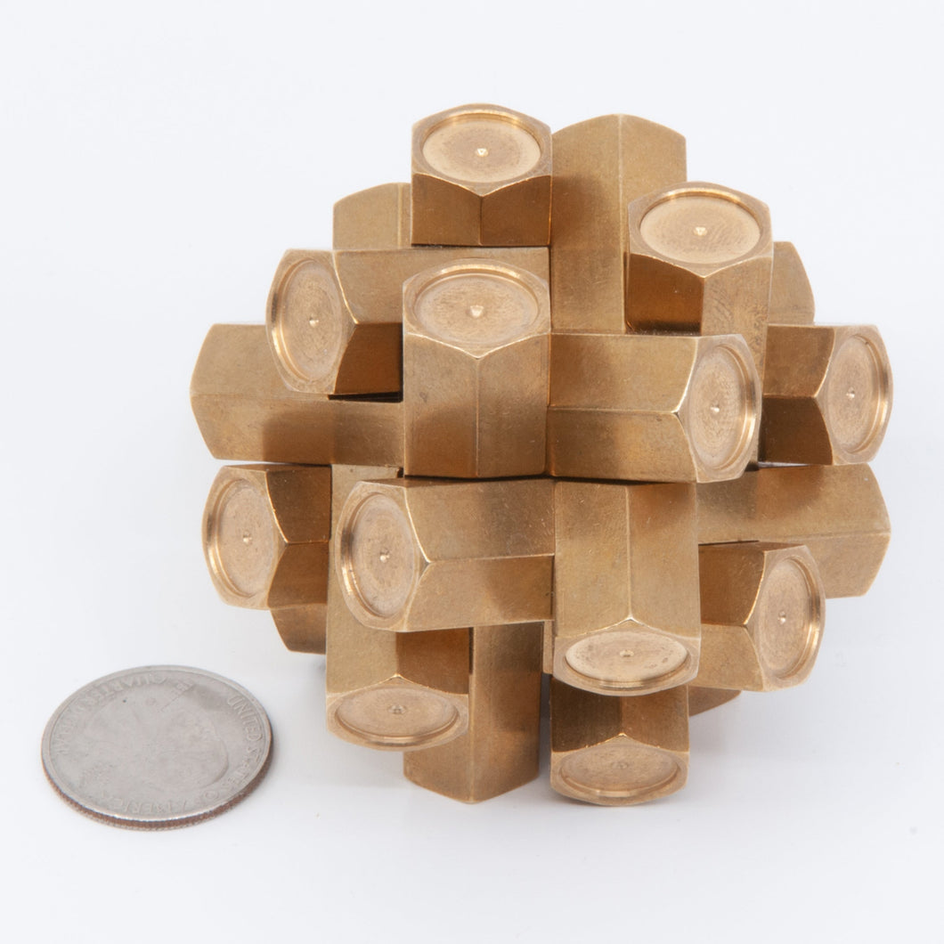 Assembled puzzle with a coin for scale
