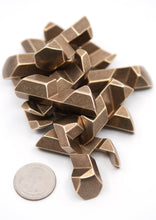 Load image into Gallery viewer, Never mind the ball locks heres the gumball puzzle diassembled into a pile of brass pieces.
