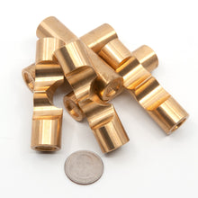 Load image into Gallery viewer,  Disassembled pieces of Brass Monkey Two. Each piece is 70mm long and 19mm in diameter, a US quarter in the foreground illustrates the scale.
