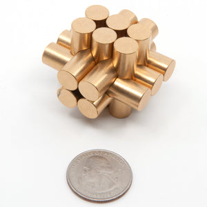 Assembled miniature 13 piece tubular burr interlocking puzzle.