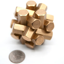 Load image into Gallery viewer, Hex puzzle with a blurred US quarter in front. The Two Brass Monkey&#39;s photographer assures us this is artistic.
