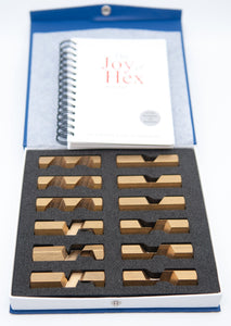 Set of 12 Puzzle pieces for the Missionary puzzle together with the bonus "Joy of Hex" positions book.