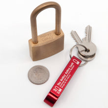 Load image into Gallery viewer, Ali Morris&#39;  Award winning HoKey CoKey trick lock puzzle picture with bottle opener key ring and US quarter for scale.
