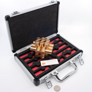 The might Kong interlocking brass puzzle sitting in it's aluminium carry case.