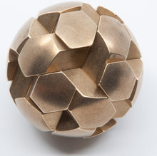 Load image into Gallery viewer, Assembled Gob Stopper Puzzle.  12 pieces form a sorta-spherical puzzle.
