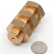 Load image into Gallery viewer, The Monkeys&#39; Nuts! A solid brass bolt with two nuts. Each turns in a different direction!
